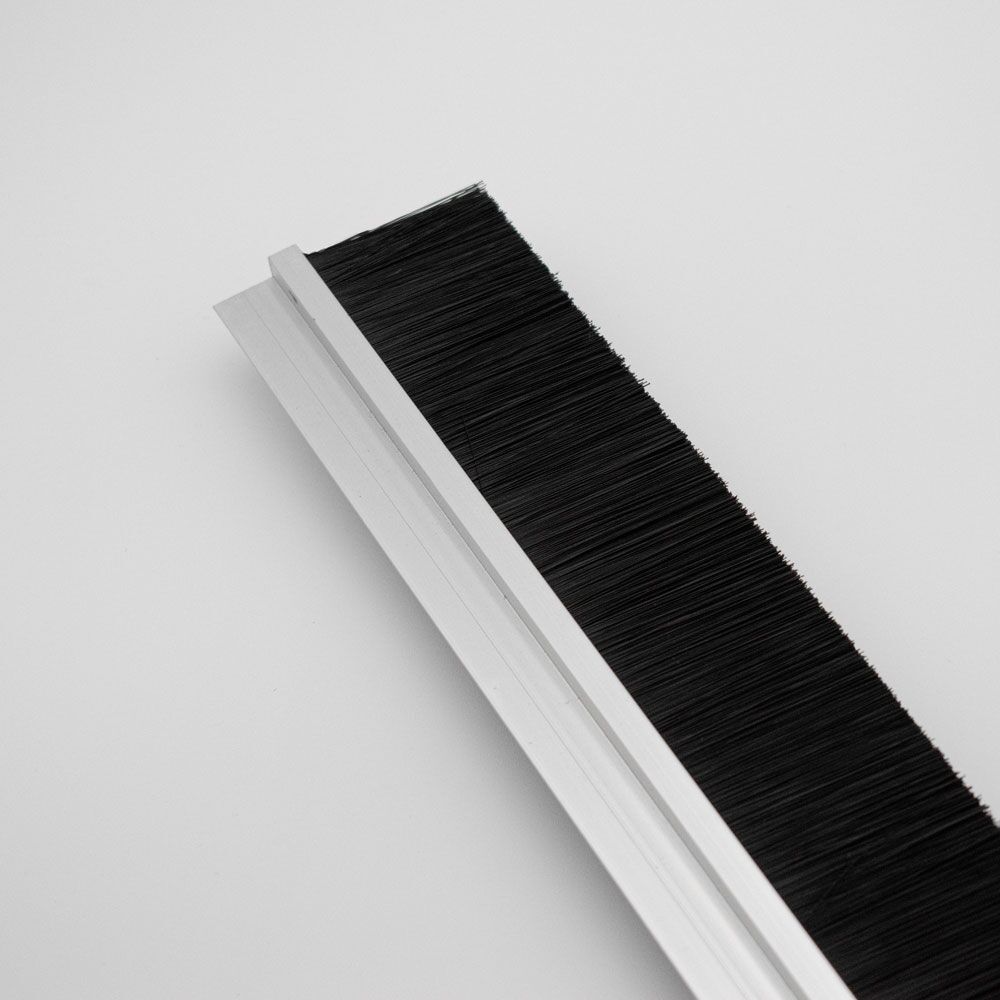 Aluminium 2m brush strip with 50mm nylon bristles for door sealing